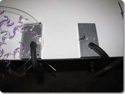 Tying a swivel to a mobile piece